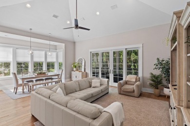 Welcome to refined coastal living in this exquisite end-unit