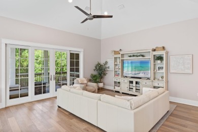 Welcome to refined coastal living in this exquisite end-unit