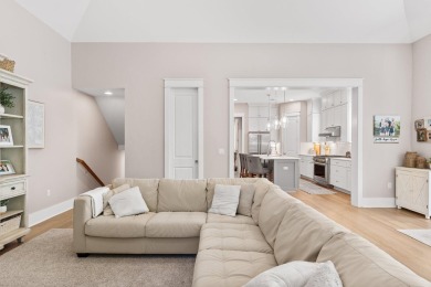 Welcome to refined coastal living in this exquisite end-unit