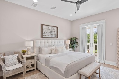 Welcome to refined coastal living in this exquisite end-unit