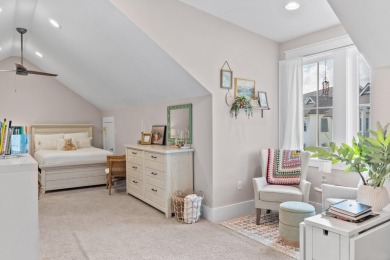 Welcome to refined coastal living in this exquisite end-unit