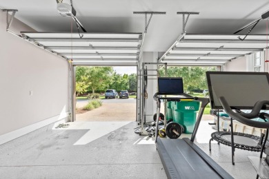 Welcome to refined coastal living in this exquisite end-unit