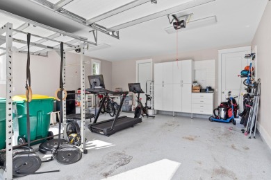 Welcome to refined coastal living in this exquisite end-unit