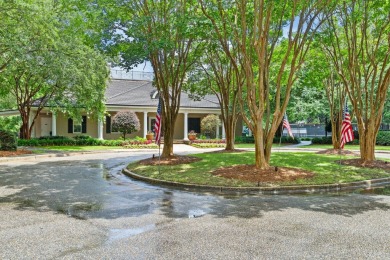 Welcome to refined coastal living in this exquisite end-unit