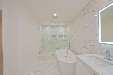 Welcome to this beautifully updated, high-end condo featuring an