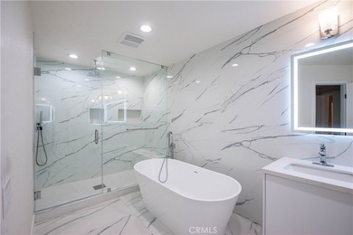 Welcome to this beautifully updated, high-end condo featuring an
