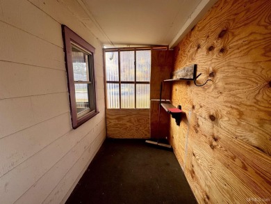 Foreclosure Opportunity!  Corner lot property with potential for