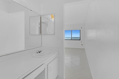 A direct Oceanfront charming 3rd floor Condo awaiting a new