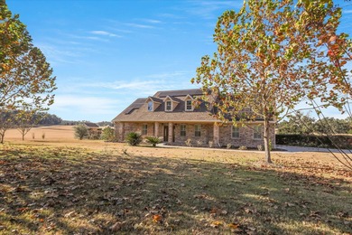 Experience exceptional craftsmanship in this custom-built home