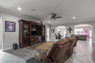 Experience exceptional craftsmanship in this custom-built home