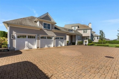 Perched above the waters of Narragansett Bay, this custom-built