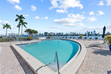Stunning 2BR/2BA waterfront condo in gated Eastern Shores! This