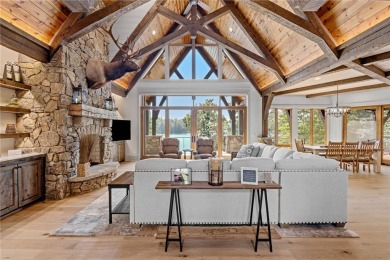 Defining lakeside luxury, this custom-built residence on one of