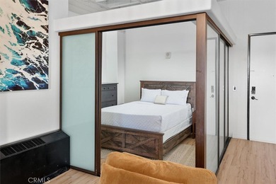 Welcome to this stunning high ceiling loft on the ninth floor of