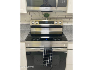 This 2 BR / 2 BA Riverfront Complex is less than one half mile