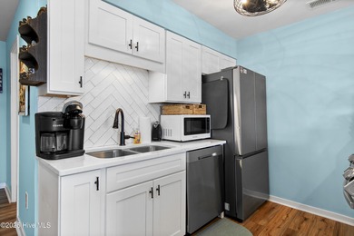 Experience the easygoing charm of coastal living in this updated