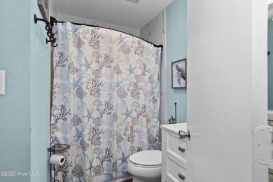 Experience the easygoing charm of coastal living in this updated