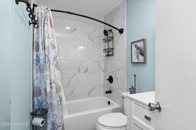 Experience the easygoing charm of coastal living in this updated