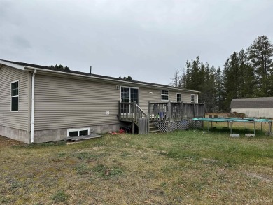 Welcome to this charming 3-bedroom, 2-bathroom ranch-style home