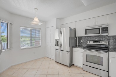 Bright, spacious 3BR/2BA corner unit in Coral Lakes, a premier
