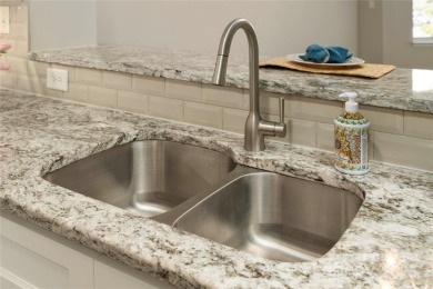 Welcome to this beautifully updated END UNIT in Spinnaker Reach