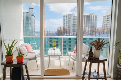 Stunning views in this rare 4016 unit at Brickell on the River