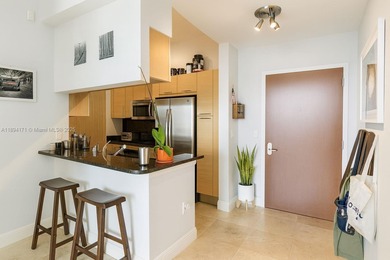 Stunning views in this rare 4016 unit at Brickell on the River