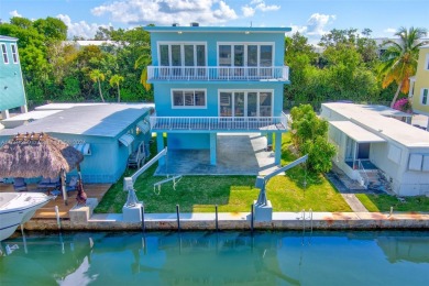 LOCATION! This spacious waterfront 3 bed 2 1/2 bath home is
