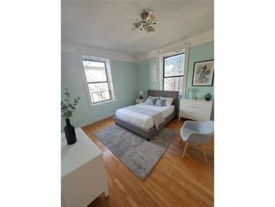 Live just moments from the sand and sea in this inviting