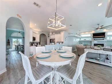 This amazing waterfront home is captivating from the moment you