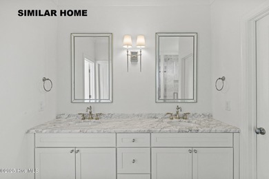 Discover unparalleled coastal living at 607a S Topsail Drive