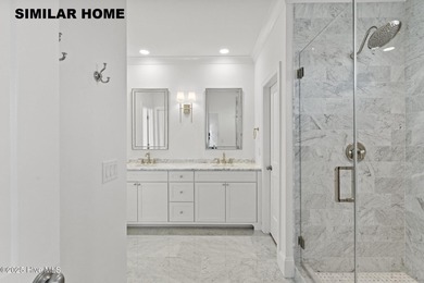 Discover unparalleled coastal living at 607a S Topsail Drive