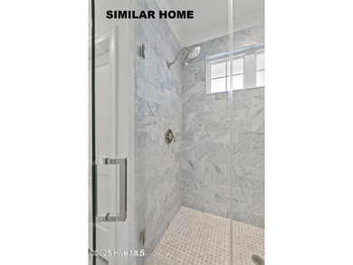 Discover unparalleled coastal living at 607a S Topsail Drive