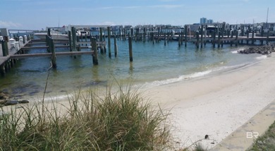 Welcome to coastal luxury at its finest. This 3-bedroom, 3-bath