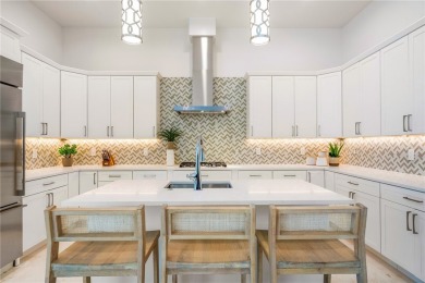 A modern twist on Key West style, this luxury cottage beckons