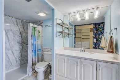 Move-in ready and filled with natural light, this stunning condo