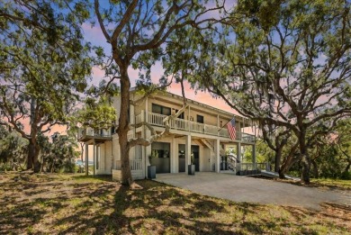 Take a look at this fabulous water front home in historic Cedar