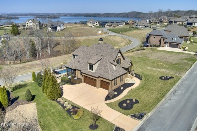Nestled in the prestigious WindRiver gated lake and golf