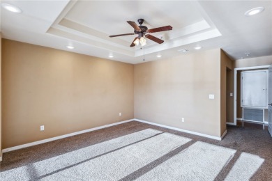 Experience riverfront living at its finest in this spacious