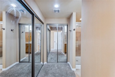 Experience riverfront living at its finest in this spacious