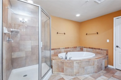 Experience riverfront living at its finest in this spacious