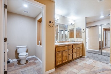 Experience riverfront living at its finest in this spacious