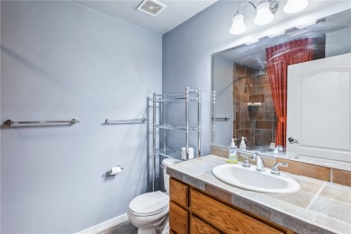 Experience riverfront living at its finest in this spacious