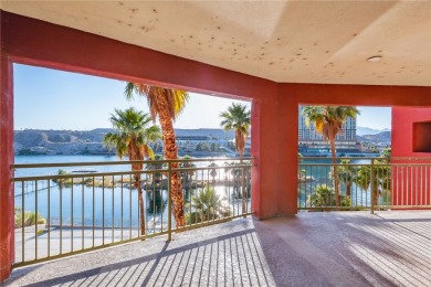 Experience riverfront living at its finest in this spacious