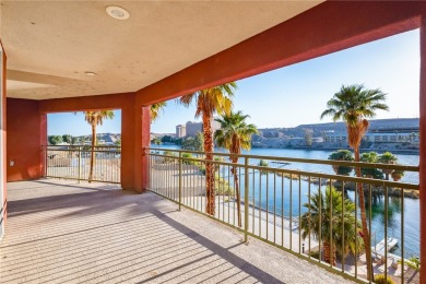 Experience riverfront living at its finest in this spacious