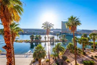 Experience riverfront living at its finest in this spacious