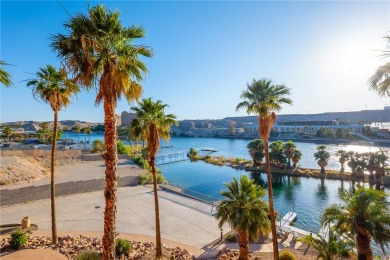 Experience riverfront living at its finest in this spacious