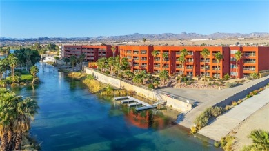 Experience riverfront living at its finest in this spacious