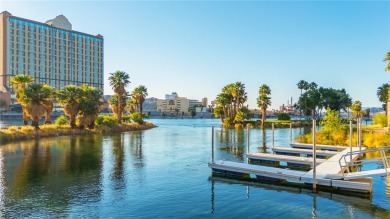 Experience riverfront living at its finest in this spacious