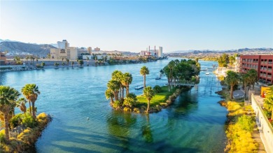 Experience riverfront living at its finest in this spacious